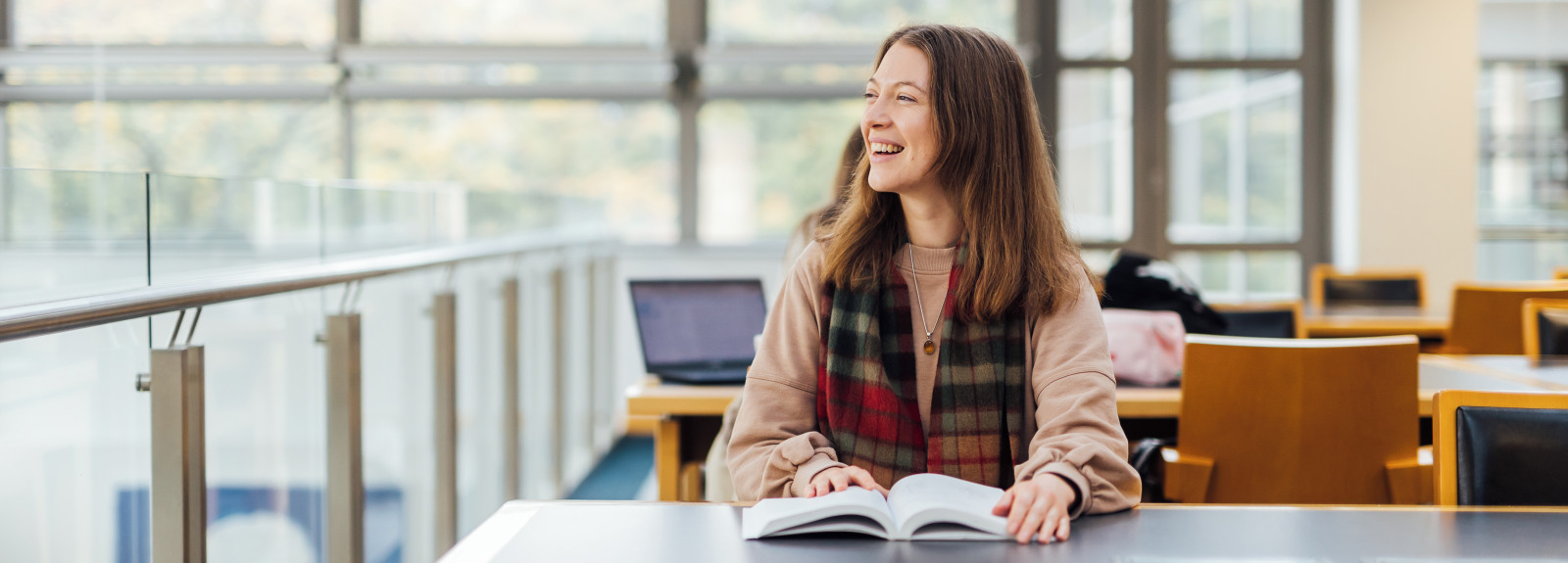 Student Lana laughing in the McClay