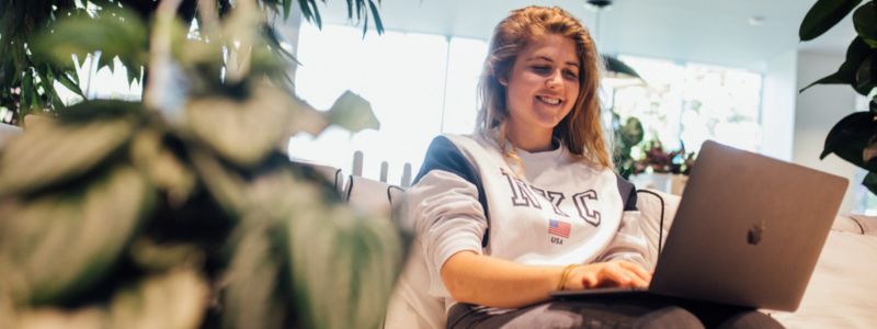 female student on a laptop