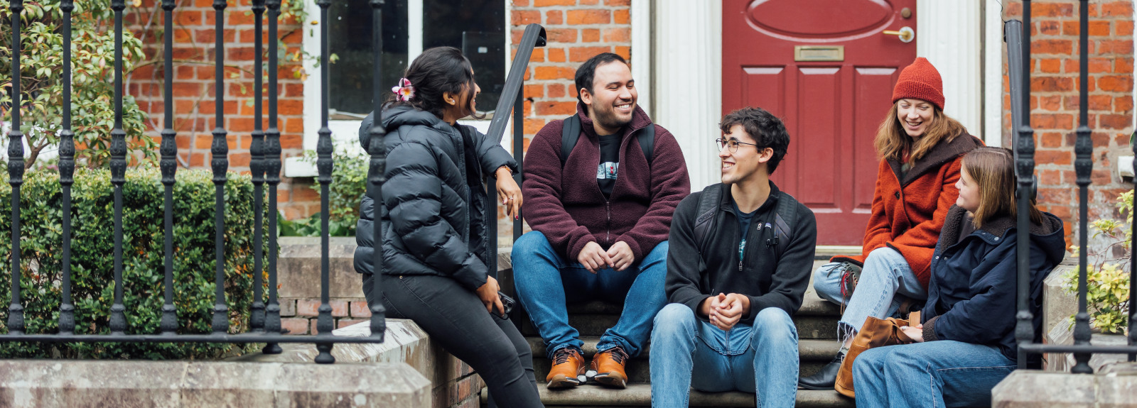 Group of students sitting on steps in University Square